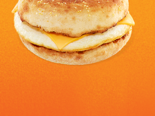 An egg and cheese sandwich on an English muffin